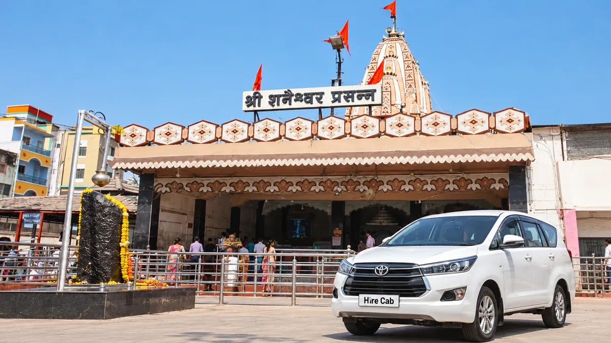 HireCab Innova Crysta at the Shani Shingnapur temple and Shani Dev shila on a Mumbai to Shani Shingnapur cab